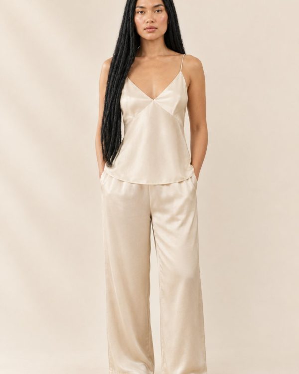 Model wearing the women's silk homewear set in a soft champagne tone